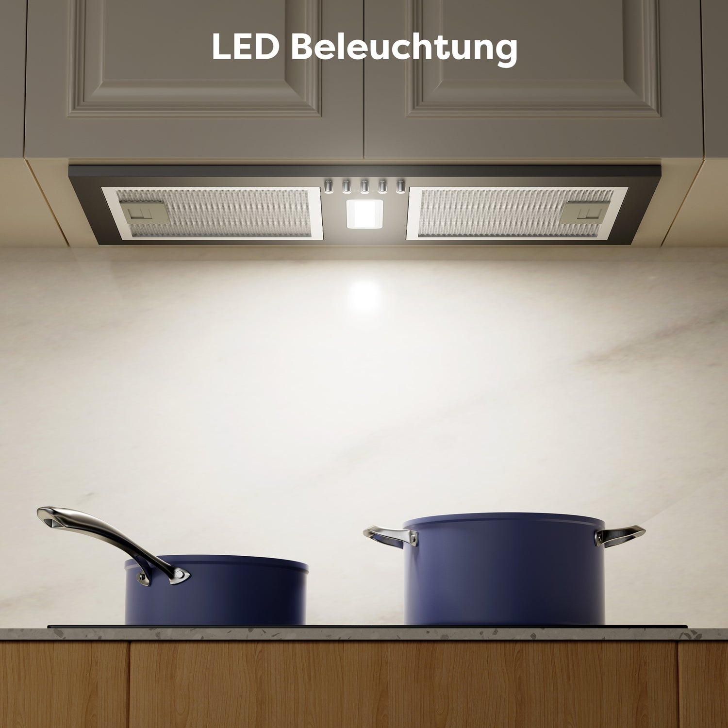 Hotte encastrable noire 52 cm installée sous un meuble de cuisine